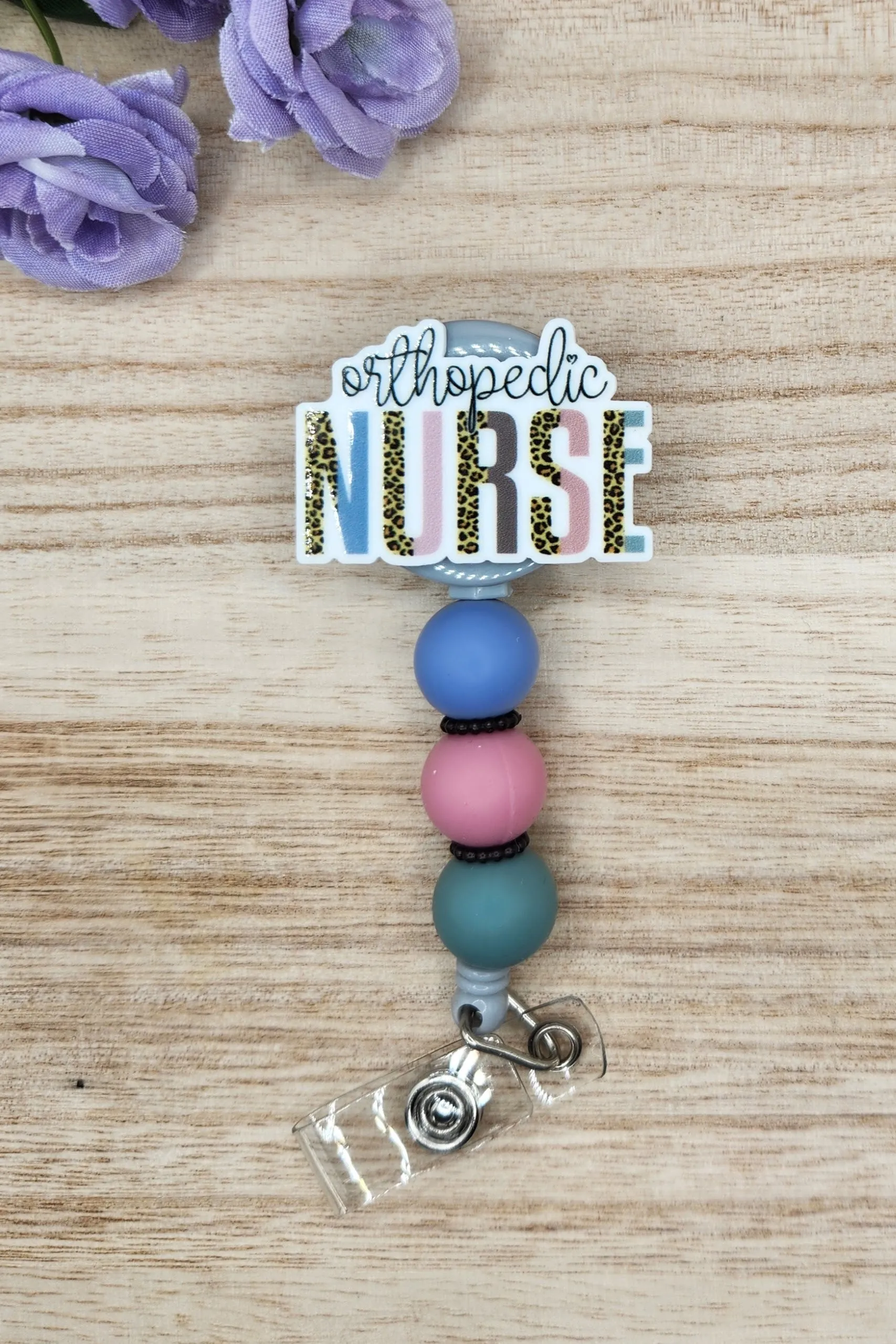 Badge Reel-Orthopedic Nurse (Leopard Letters) NP016